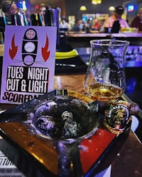 a sign that says tues night out & light